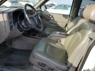 2000 Oldsmobile Bravada z VIN 1GHDT13W9Y2384823, wystawiony jako Copart lot #83105794 z przebiegiem Nie podano mil oraz Tytuł czysty. Historia ofert i sprzedaży dostępna na DreamBid. Obrazek 7.