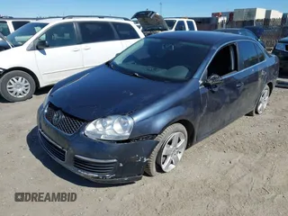 2009 Volkswagen Jetta SE with VIN 3VWRZ71K19M122492, listed as a IAAI auction lot 42270119 with 107,040 mi miles and . Bid and sale history available at DreamBid. Image 2.