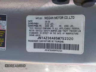 2005 Nissan 350Z Touring with VIN JN1AZ36A85M752320, listed as a IAAI auction lot 42001942 with 174,564 mi miles. Bid and sale history available at carsss.com. Image 9.