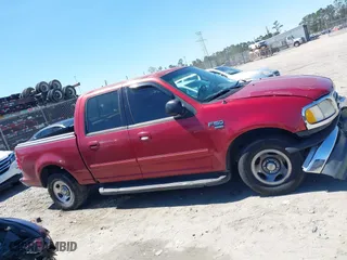 2001 Ford F-150 SuperCrew XLT with VIN 1FTRW07L11KE20412, listed as a IAAI auction lot 41877980 with 1 mi miles. Bid and sale history available at carsss.com. Image 12.