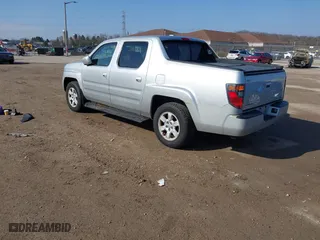 2006 Honda Ridgeline RTL with VIN 2HJYK16576H555999, listed as a IAAI auction lot 42023875 with 202,128 mi miles. Bid and sale history available at carsss.com. Image 3.