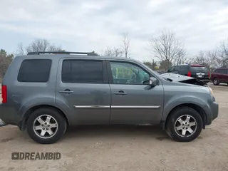 2010 Honda Pilot Touring with VIN 5FNYF4H81AB038522, listed as a IAAI auction lot 41893997 with Not Provided miles. Bid and sale history available at carsss.com. Image 12.