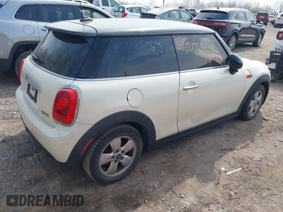 2015 MINI Hardtop with VIN WMWXM5C50FT973617, listed as a IAAI auction lot 42024129 with 94,168 mi miles and . Bid and sale history available at DreamBid. Image 4.