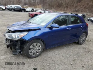2019 Kia Rio S with VIN 3KPA25AB4KE233188, listed as a Copart auction lot 86828634 with 52,305 mi miles and Salvage Title. Bid and sale history available at DreamBid. Image 1.