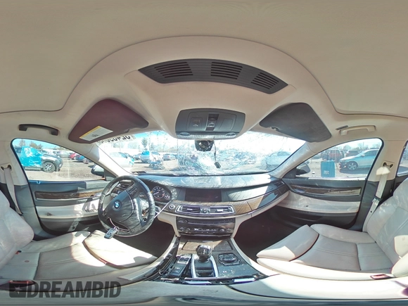 2011 BMW 7 Series 750i xDrive с VIN WBAKC6C59BC394610, выставлен на аукционе Copart как лот 52459035 с пробегом 171 581 миль миль и Списание • Salvage title. История ставок и продаж доступна на DreamBid. Изображение 12.