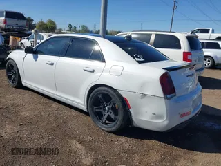 2012 Chrysler 300 SRT-8 with VIN 2C3CCAFJ9CH801749, listed as a IAAI auction lot 40912606 with 144,404 mi miles and . Bid and sale history available at DreamBid. Image 3.