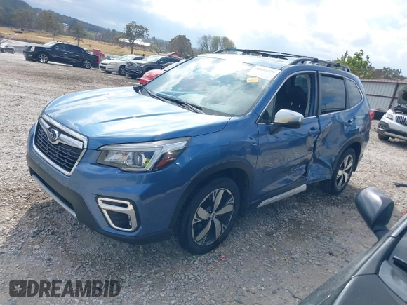 2020 Subaru Forester Touring with VIN JF2SKAXCXLH433924, listed as a IAAI auction lot 40693779 with 36,870 mi miles. Bid and sale history available at carsss.com. Image 2.