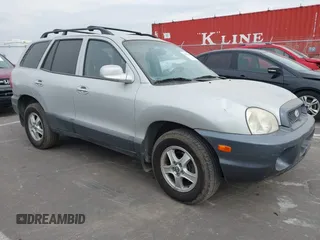 2003 Hyundai Santa Fe LX with VIN KM8SC73E83U568666, listed as a IAAI auction lot 41679044 with 127,560 mi miles. Bid and sale history available at carsss.com. Image 1.