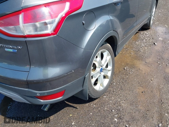 2014 Ford Escape Titanium with VIN 1FMCU9J99EUA75276, listed as a IAAI auction lot 42148537 with 163,330 mi miles and . Bid and sale history available at DreamBid. Image 6.