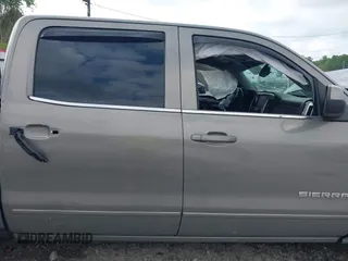 2017 GMC Sierra 1500 SLE z VIN 3GTP1MEC0HG230277, wystawiony jako IAAI lot #41997297 z przebiegiem Nie podano mil oraz . Historia ofert i sprzedaży dostępna na DreamBid. Obrazek 13.