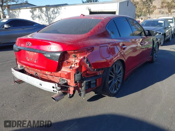 2021 Infiniti Q50 Red Sport 400 with VIN JN1FV7DP3MM850783, listed as a IAAI auction lot 41335175 with 59,113 mi miles and . Bid and sale history available at DreamBid. Image 4.