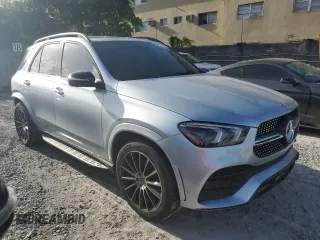 2023 Mercedes-Benz GLE 350 with VIN 4JGFB4KB7PA958739, listed as a Copart auction lot 65011704 with 6,657 mi miles and Salvage title. Bid and sale history available at DreamBid. Image 4.