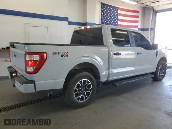 2023 Ford F-150 XL with VIN 1FTEW1EP9PKF55852, listed as a Copart auction lot 58379025 with 46,939 mi miles and Salvage title. Bid and sale history available at DreamBid. Image 3.