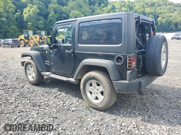 2012 Jeep Wrangler Sport with VIN 1C4AJWAG6CL256792, listed as a Copart auction lot 62634515 with 137,507 mi miles and Salvage title. Bid and sale history available at DreamBid. Image 2.