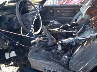 1985 Chevrolet Monte Carlo Sport с VIN 1G1GZ37Z2FR127808, выставлен на аукционе Copart как лот 76112524 с пробегом Не указан миль и Списание • Salvage title. История ставок и продаж доступна на DreamBid. Изображение 7.