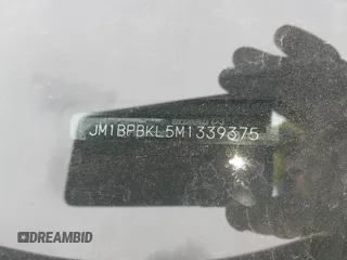 2021 Mazda 3 Select with VIN JM1BPBKL5M1339375, listed as a IAAI auction lot 42547155 with 43,793 mi miles and . Bid and sale history available at DreamBid. Image 9.
