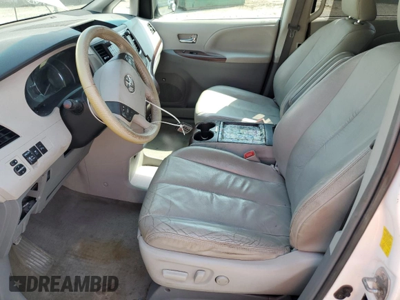 2011 Toyota Sienna XLE with VIN 5TDDK3DC4BS004280, listed as a Copart auction lot 59297345 with 173,890 mi miles and Salvage title. Bid and sale history available at DreamBid. Image 7.