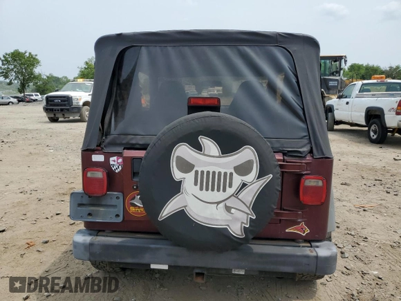 2002 Jeep Wrangler X z VIN 1J4FA39S42P773815, wystawiony jako Copart lot #60016255 z przebiegiem 174 803 mil mil oraz Szkoda całkowita • Salvage title. Historia ofert i sprzedaży dostępna na DreamBid. Obrazek 6.