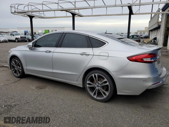 2019 Ford Fusion Titanium with VIN 3FA6P0D90KR187859, listed as a Copart auction lot 88341915 with 93,518 mi miles and Salvage Title. Bid and sale history available at carsss.com. Image 2.