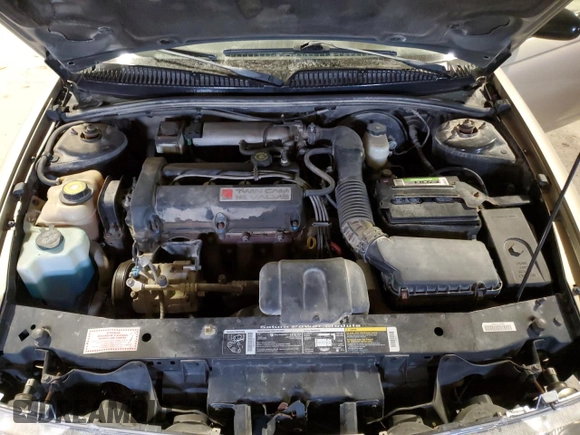 1999 Saturn SL z VIN 1G8ZK5277XZ266298, wystawiony jako Copart lot #41371855 z przebiegiem 85 882 mil mil oraz Szkoda całkowita • Salvage title. Historia ofert i sprzedaży dostępna na DreamBid. Obrazek 11.