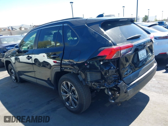 2024 Toyota RAV4 Hybrid XLE Premium with VIN JTMB6RFV0RD126685, listed as a IAAI auction lot 41870692 with 21,637 mi miles. Bid and sale history available at carsss.com. Image 14.