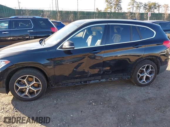 2018 BMW X1 xDrive28i with VIN WBXHT3C36J5L29746, listed as a IAAI auction lot 41547100 with 103,420 mi miles and . Bid and sale history available at DreamBid. Image 6.