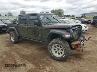 2021 Jeep Gladiator Rubicon with VIN 1C6JJTBM6ML580028, listed as a Copart auction lot 56526085 with 55,462 mi miles and Salvage title. Bid and sale history available at DreamBid. Image 4.