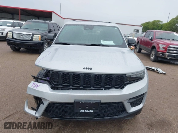 2023 Jeep Grand Cherokee Altitude with VIN 1C4RJHAG8PC611840, listed as a IAAI auction lot 42336992 with 41,100 mi miles and . Bid and sale history available at DreamBid. Image 13.