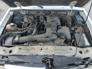 2002 Ford Ranger XL with VIN 1FTYR10DX2TA66722, listed as a Copart auction lot 54425765 with 246,813 mi miles and Non repairable. Bid and sale history available at DreamBid. Image 11.