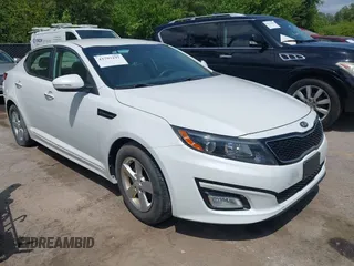 2014 Kia Optima LX with VIN 5XXGM4A7XEG347086, listed as a IAAI auction lot 42793197 with 96,308 mi miles and . Bid and sale history available at DreamBid. Image 1.