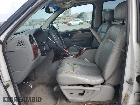 2006 GMC Envoy SLE z VIN 1GKDS13S462144683, wystawiony jako Copart lot #58277565 z przebiegiem Nie podano mil oraz Czysty tytuł • Clean title. Historia ofert i sprzedaży dostępna na DreamBid. Obrazek 7.
