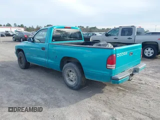 1997 Dodge Dakota with VIN 1B7FL26X3VS129959, listed as a IAAI auction lot 41317635 with 316,307 mi miles and . Bid and sale history available at carsss.com. Image 3.
