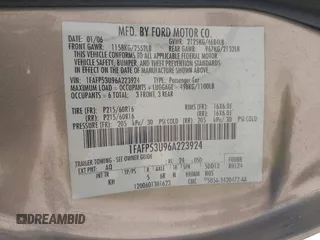 2006 Ford Taurus SE with VIN 1FAFP53U96A223924, listed as a IAAI auction lot 41828443 with 114,653 mi miles. Bid and sale history available at carsss.com. Image 9.