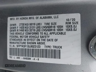2020 Honda Ridgeline Sport with VIN 5FPYK3F13LB023123, listed as a IAAI auction lot 41694273 with 51,934 mi miles and . Bid and sale history available at DreamBid. Image 9.