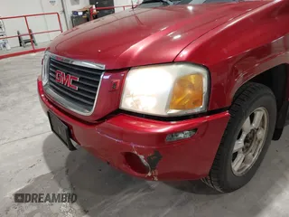 2005 GMC Envoy SLT with VIN 1GKDT13S352324863, listed as a IAAI auction lot 41707649 with 247,326 mi miles. Bid and sale history available at carsss.com. Image 6.