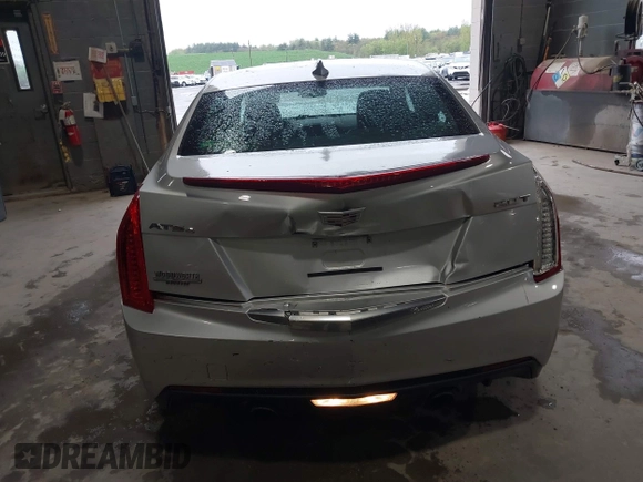 2016 Cadillac ATS Standard AWD z VIN 1G6AG5RX6G0149829, wystawiony jako IAAI lot #42165534 z przebiegiem 40 996 mil mil oraz . Historia ofert i sprzedaży dostępna na DreamBid. Obrazek 6.
