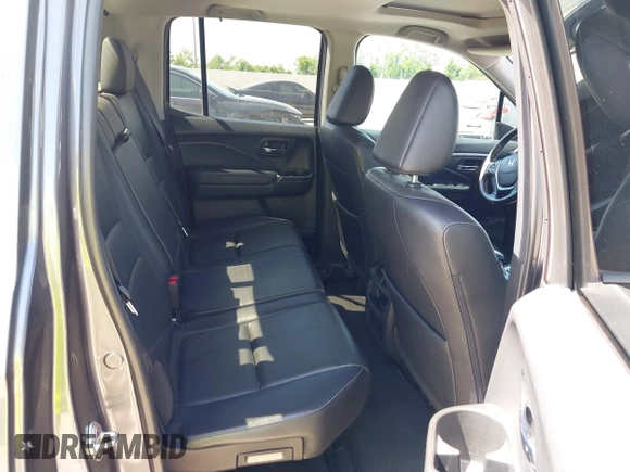 2019 Honda Ridgeline RTL with VIN 5FPYK2F59KB004653, listed as a IAAI auction lot 42066778 with 90,144 mi miles and . Bid and sale history available at DreamBid. Image 8.