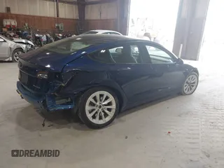 2022 Tesla Model 3 Long Range with VIN 5YJ3E1EB8NF255163, listed as a IAAI auction lot 42105451 with 40,166 mi miles and . Bid and sale history available at DreamBid. Image 4.