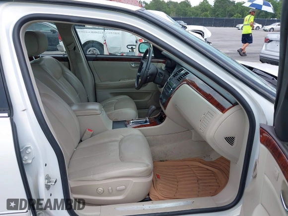2007 Cadillac DTS Luxury I z VIN 1G6KD57Y67U123765, wystawiony jako IAAI lot #42495242 z przebiegiem 56 193 mil mil oraz . Historia ofert i sprzedaży dostępna na DreamBid. Obrazek 5.