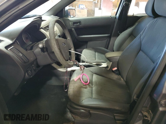 2010 Ford Focus SE with VIN 1FAHP3FN1AW146737, listed as a Copart auction lot 76261654 with 140,988 mi miles and Salvage Title. Bid and sale history available at DreamBid. Image 7.