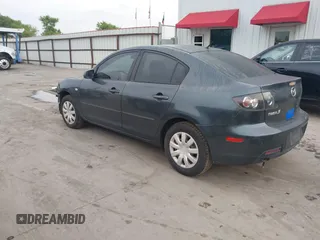 2009 Mazda 3 i Touring Value with VIN JM1BK32F291235335, listed as a IAAI auction lot 41880603 with 144,358 mi miles and . Bid and sale history available at DreamBid. Image 3.