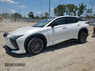 2023 Lexus RZ 450e Premium z VIN JTJAAAAB7PA001851, wystawiony jako Copart lot #57144464 z przebiegiem 3731 mil mil oraz Szkody całkowita. Historia ofert i sprzedaży dostępna na DreamBid. Obrazek 1.