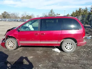 1999 Dodge Caravan z VIN 1B4GP45G7XB554879, wystawiony jako IAAI lot #41644242 z przebiegiem Nie podano mil oraz . Historia ofert i sprzedaży dostępna na DreamBid. Obrazek 15.