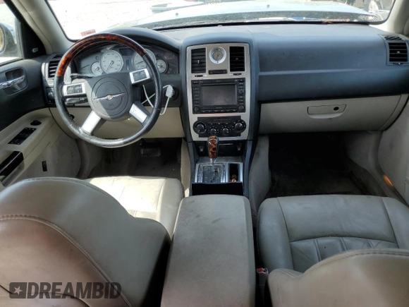 2007 Chrysler 300 C z VIN 2C3KA63H57H725971, wystawiony jako Copart lot #51793044 z przebiegiem 137 825 mil mil oraz Szkoda całkowita • Salvage title. Historia ofert i sprzedaży dostępna na DreamBid. Obrazek 8.