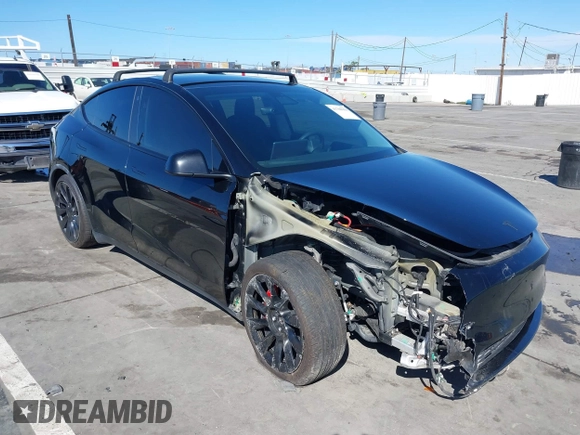 2021 Tesla Model Y Performance with VIN 5YJYGDEF9MF251738, listed as a IAAI auction lot 41708950 with 61,248 mi miles and . Bid and sale history available at DreamBid. Image 1.