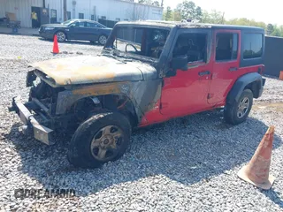 2011 Jeep Wrangler Unlimited Sport z VIN 1J4BZ3H17BL638996, wystawiony jako IAAI lot #41936385 z przebiegiem Nie podano mil oraz . Historia ofert i sprzedaży dostępna na DreamBid. Obrazek 2.