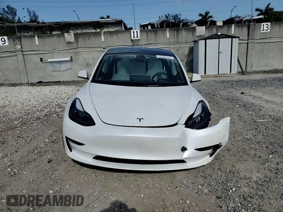 2023 Tesla Model 3 z VIN 5YJ3E1EAXPF422956, wystawiony jako Copart lot #52500285 z przebiegiem 24 082 mil mil oraz Nie do naprawy • Non repairable. Historia ofert i sprzedaży dostępna na DreamBid. Obrazek 13.