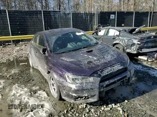 2014 Mitsubishi Lancer Evolution GSR z VIN JA32W8FV6EU010233, wystawiony jako Copart lot #42787275 z przebiegiem 74 780 mil mil oraz Szkody całkowita. Historia ofert i sprzedaży dostępna na DreamBid. Obrazek 10.