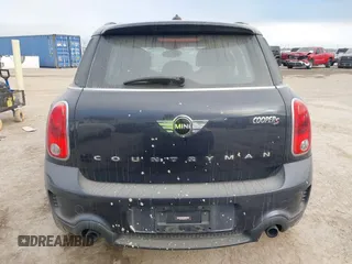 2013 MINI Countryman S with VIN WMWZC3C59DWP24390, listed as a IAAI auction lot 42038509 with 134,903 mi miles and . Bid and sale history available at DreamBid. Image 17.
