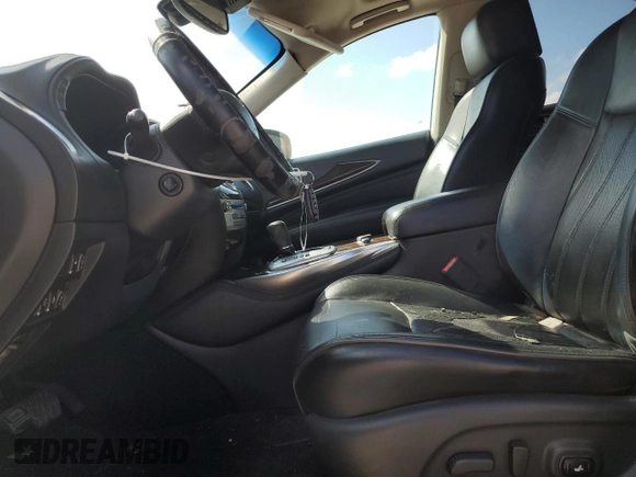 2013 Infiniti JX35 with VIN 5N1AL0MMXDC345884, listed as a Copart auction lot 71356404 with 150,655 mi miles and Salvage Title. Bid and sale history available at carsss.com. Image 7.